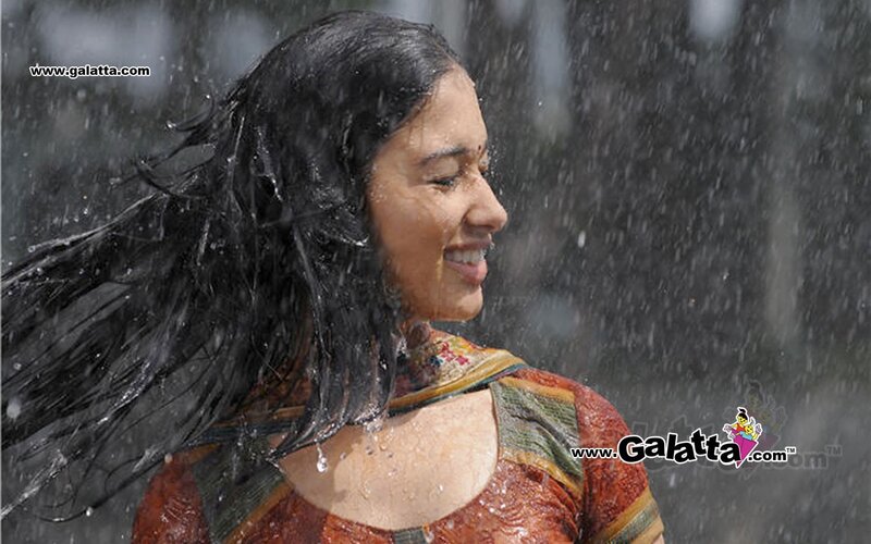 woman smiling in the rain