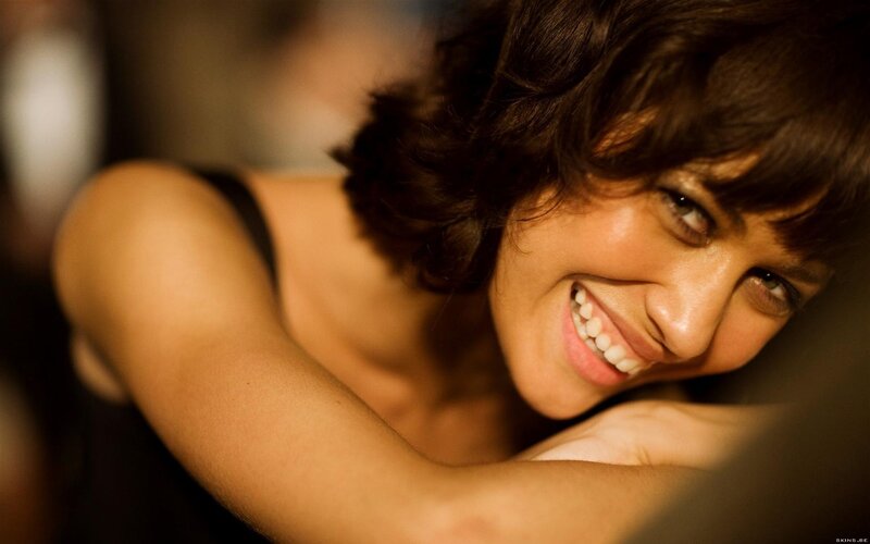 woman smiling in warm light