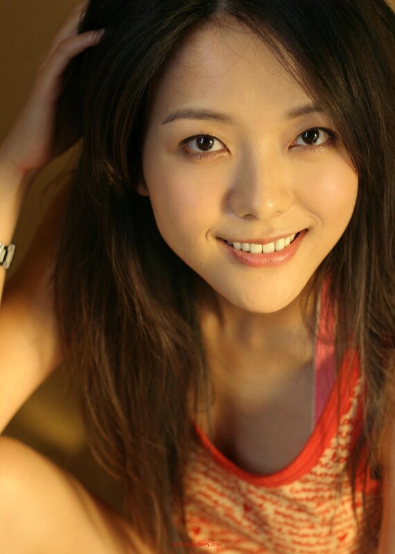 woman smiling in warm light