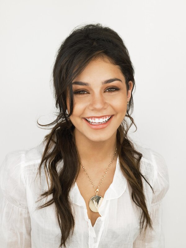 woman smiling in white blouse