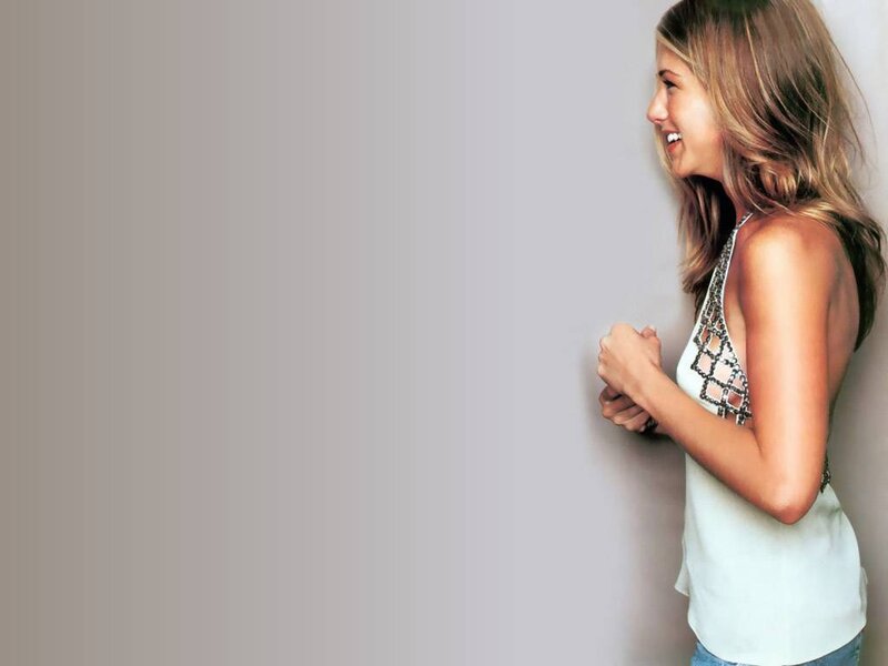 woman smiling in white top