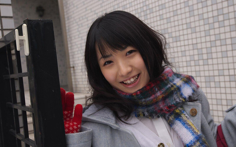 woman smiling in winter clothes