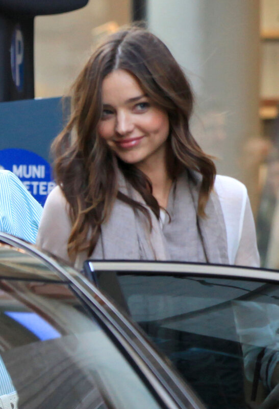woman smiling near car