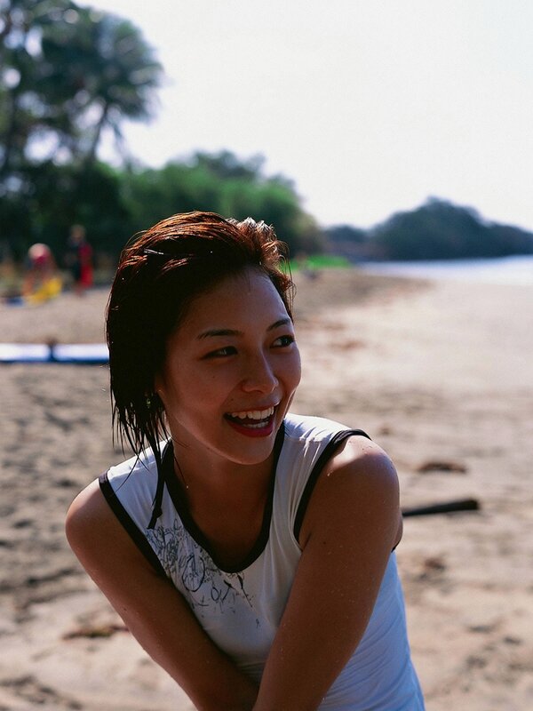 Woman smiling on a beach