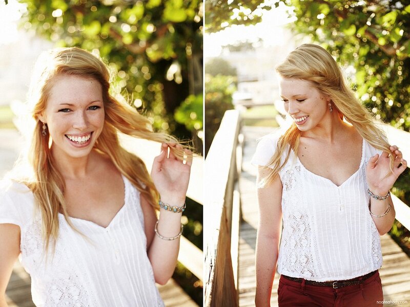 woman smiling on a boardwalk