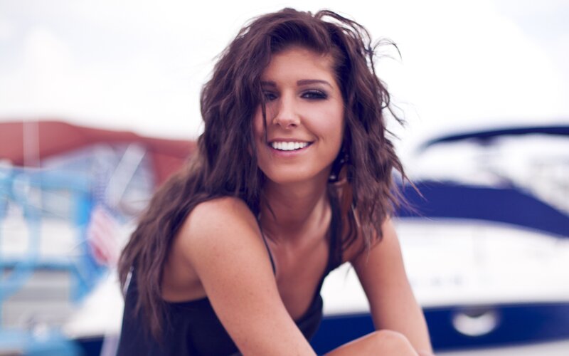 woman smiling on a boat
