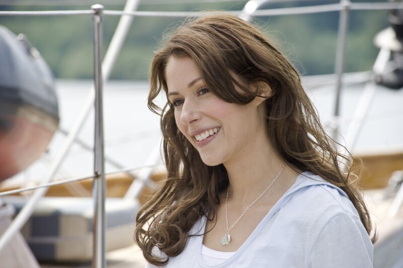 woman smiling on a boat
