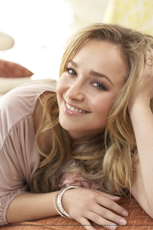 woman smiling on a couch