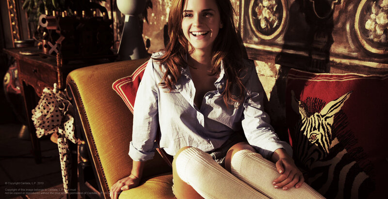 woman smiling on a couch