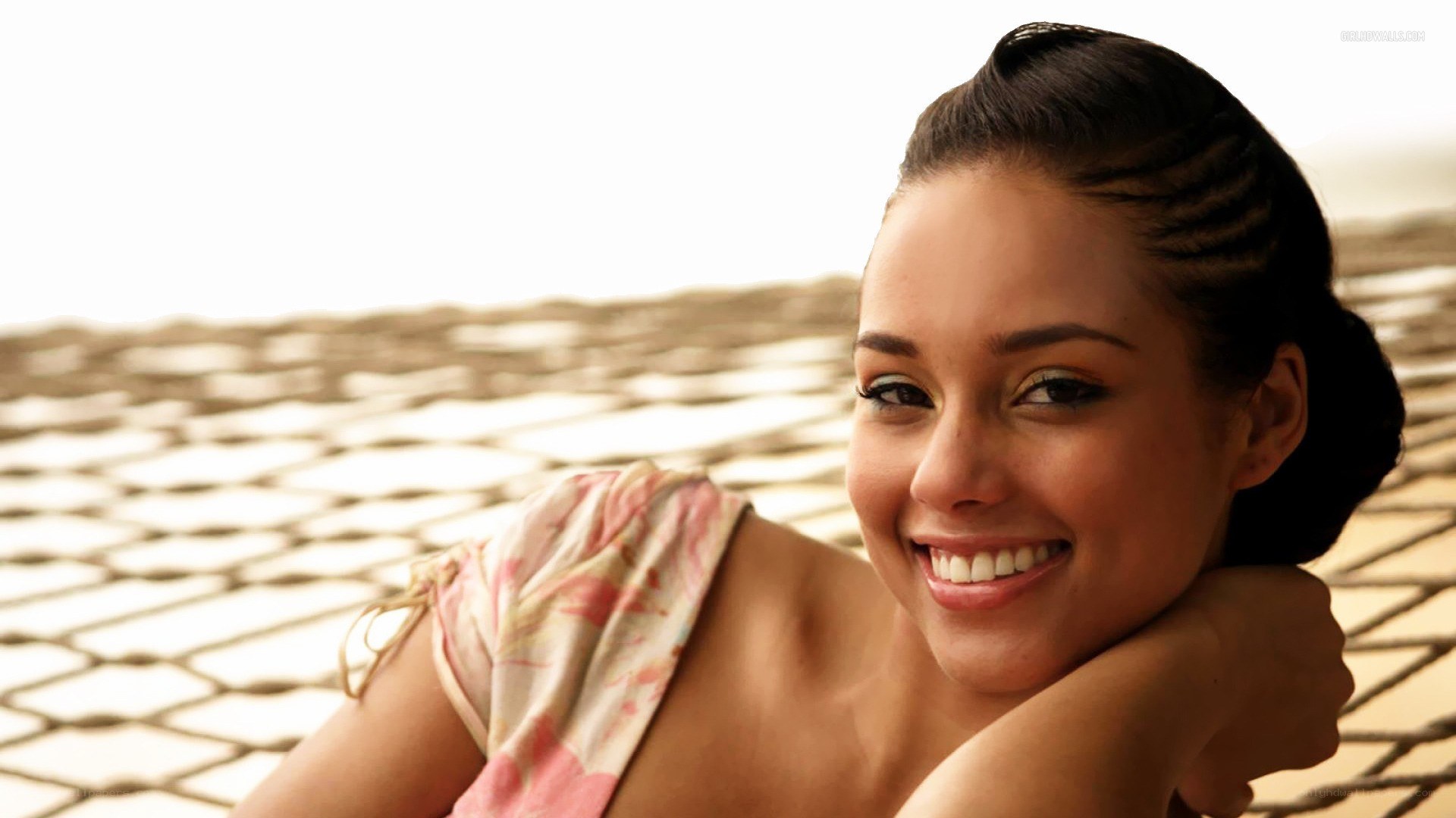 woman smiling on a hammock