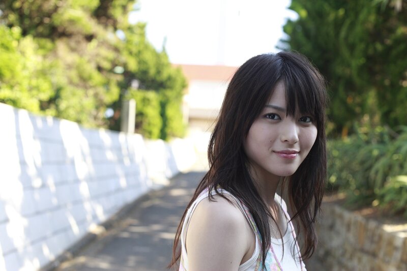 woman smiling on a path