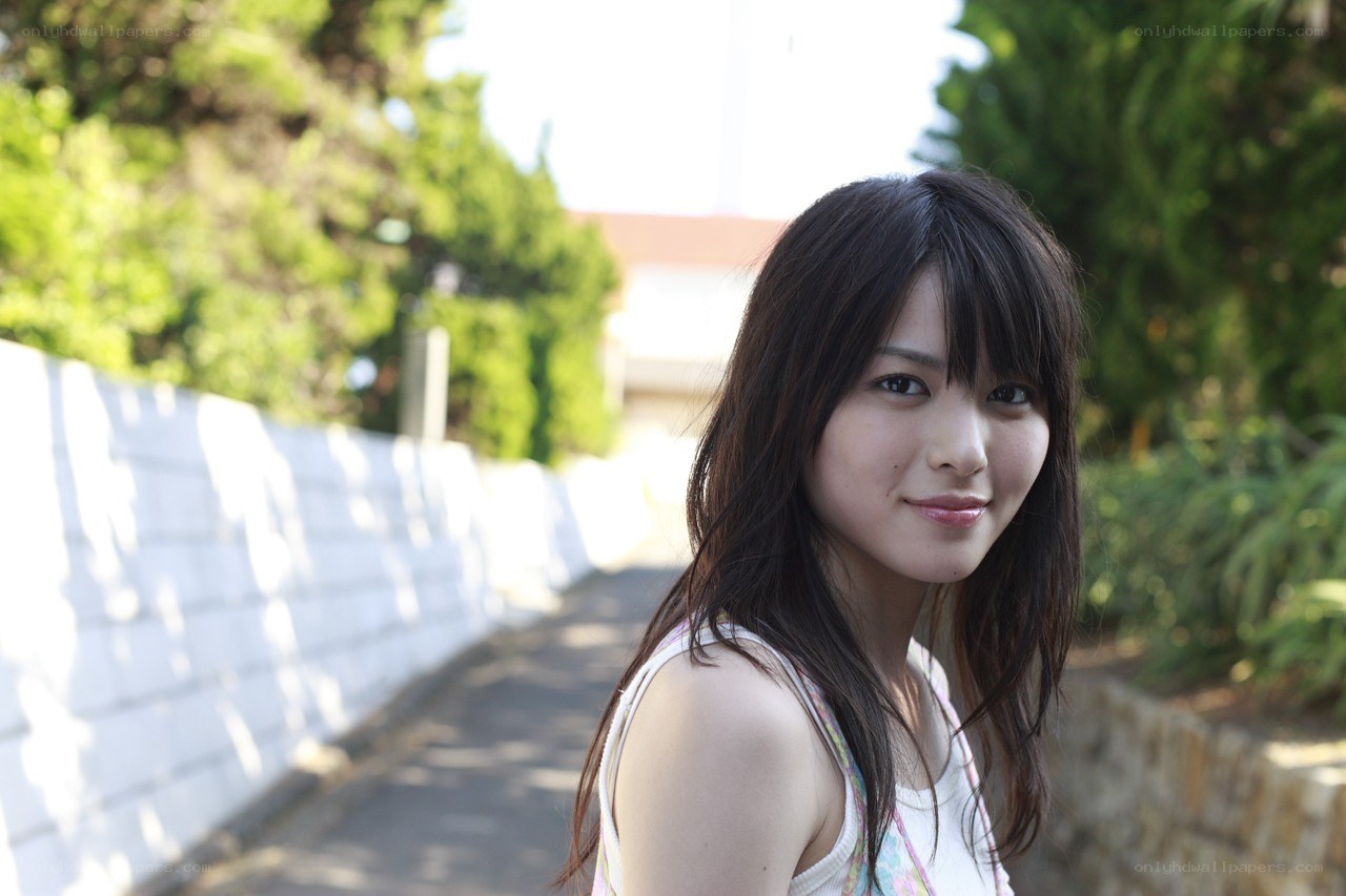 woman smiling on a path