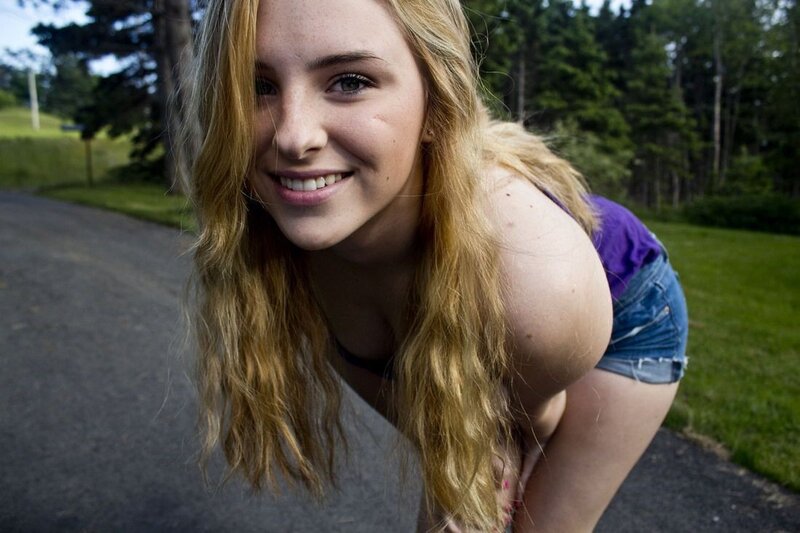woman smiling on a road