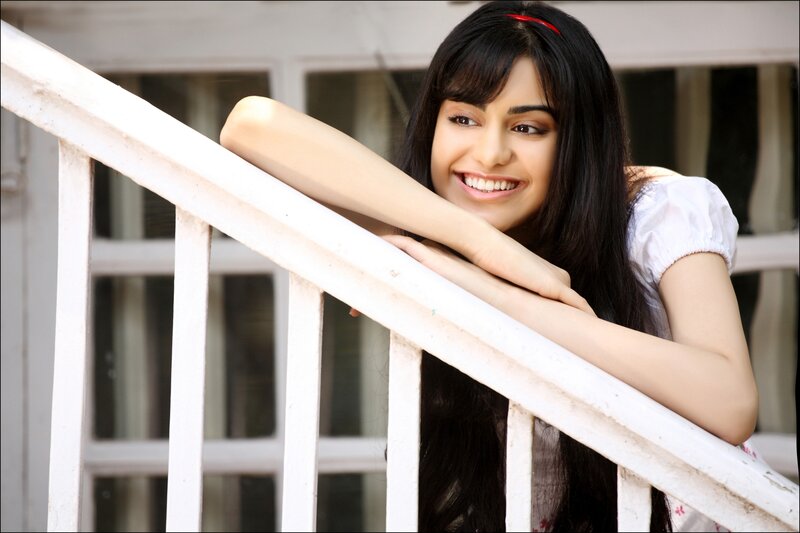 woman smiling on balcony
