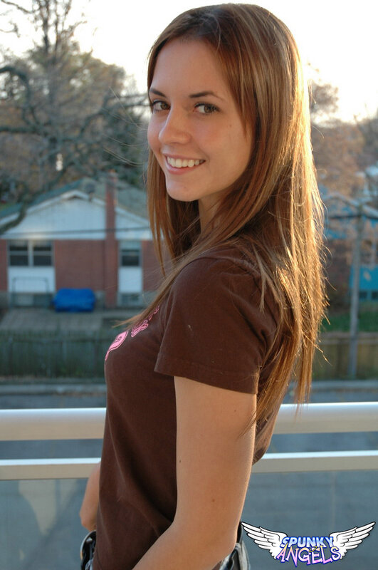 woman smiling on balcony