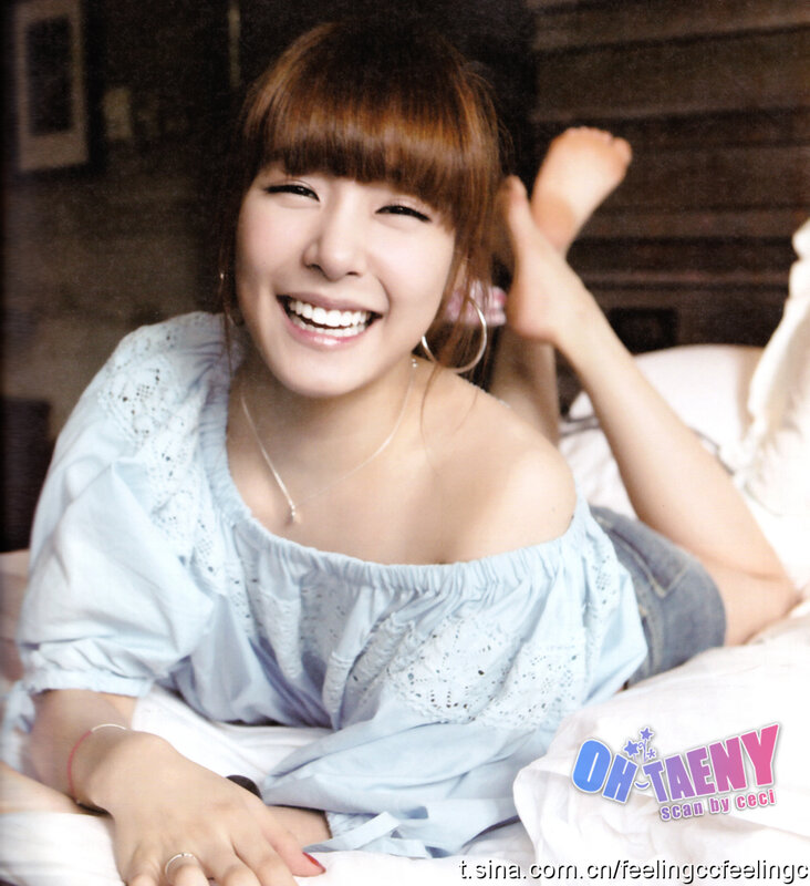 woman smiling on bed