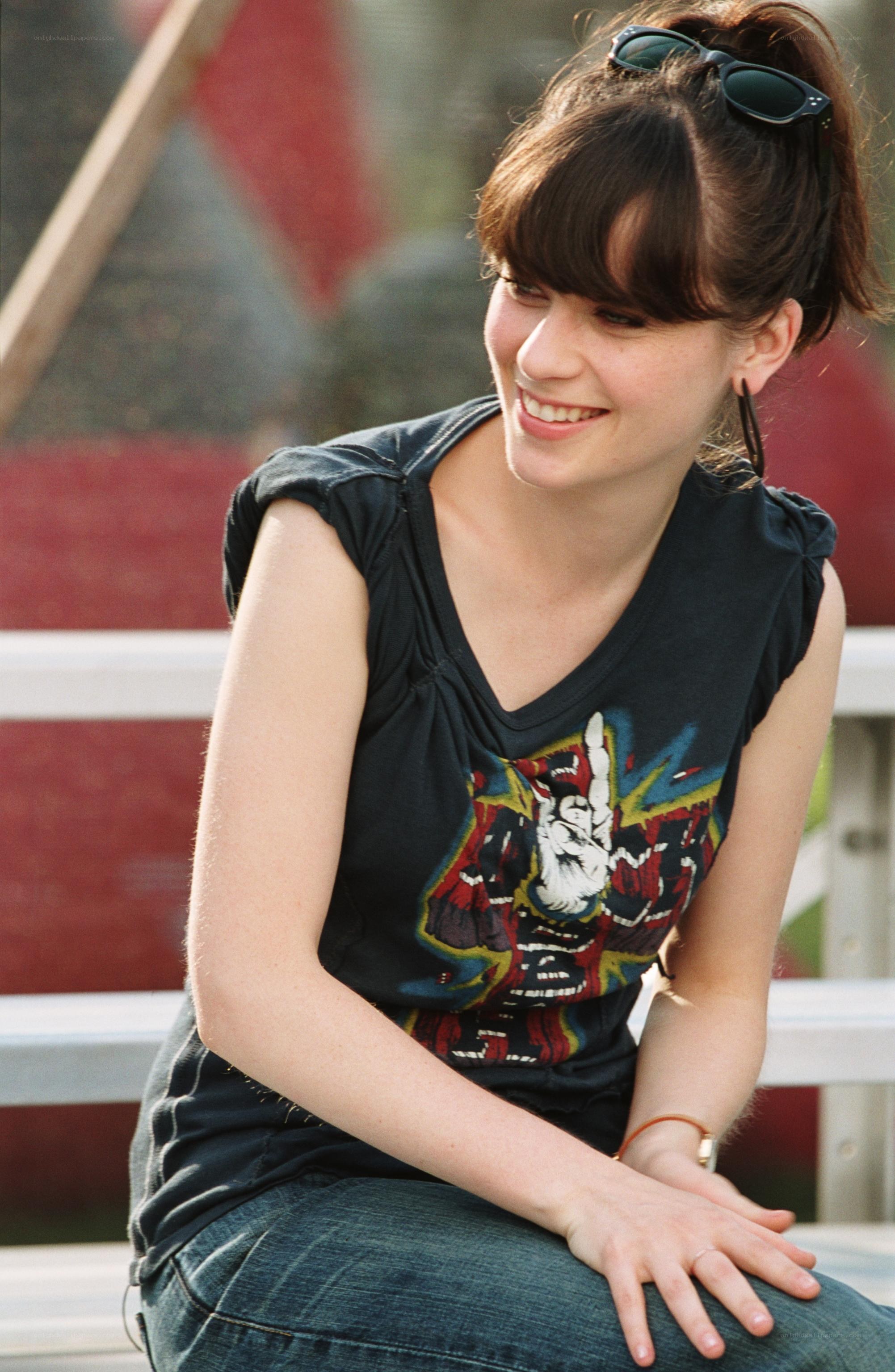 woman smiling on bench