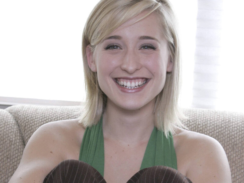 woman smiling on couch