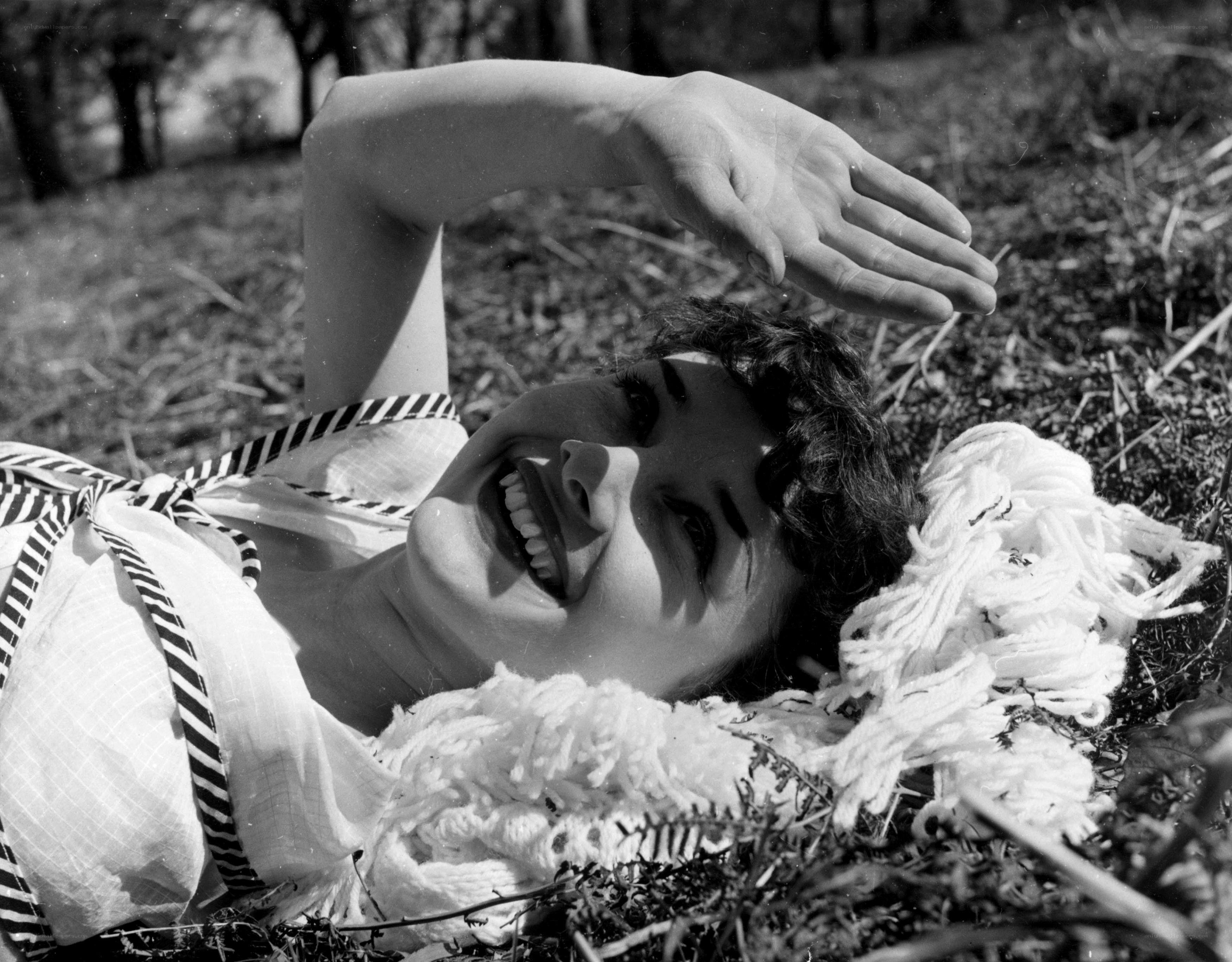 Woman smiling on grass