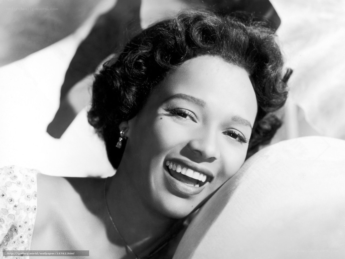 woman smiling on pillow
