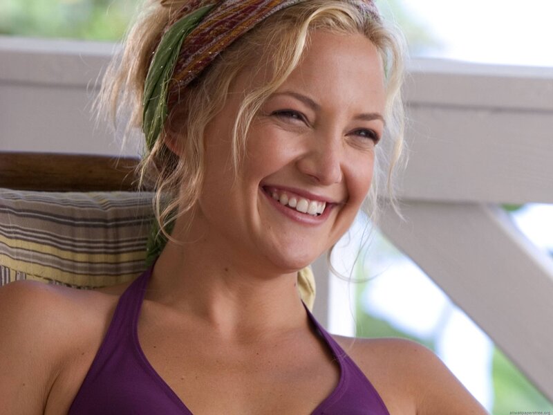 woman smiling on porch