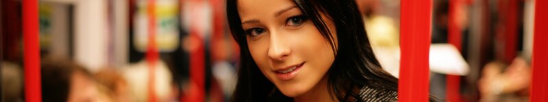 woman smiling on public transport