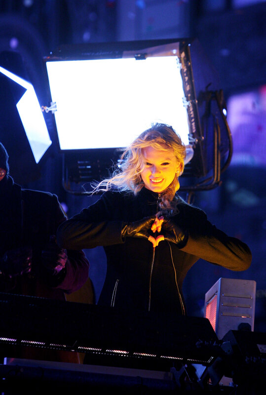 woman smiling on stage