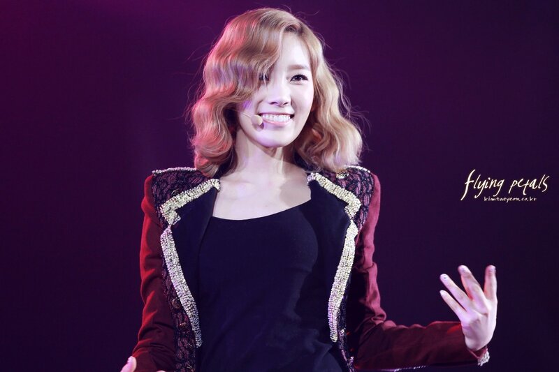 woman smiling on stage