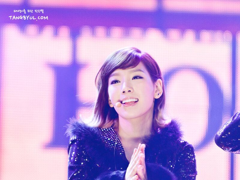 woman smiling on stage