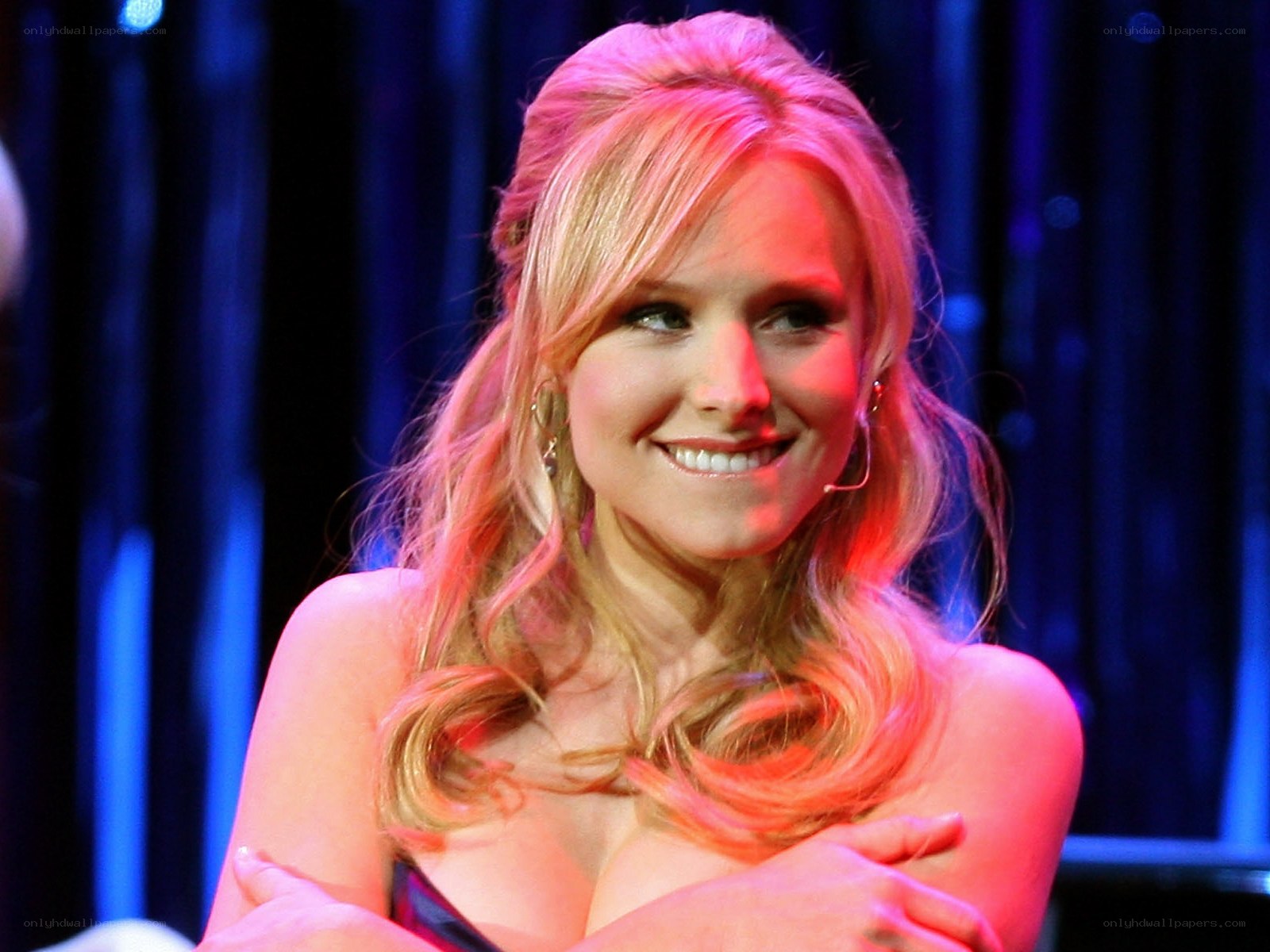 woman smiling on stage