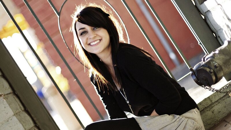 woman smiling on stairs