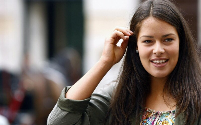 woman smiling on street