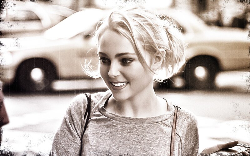 woman smiling on street