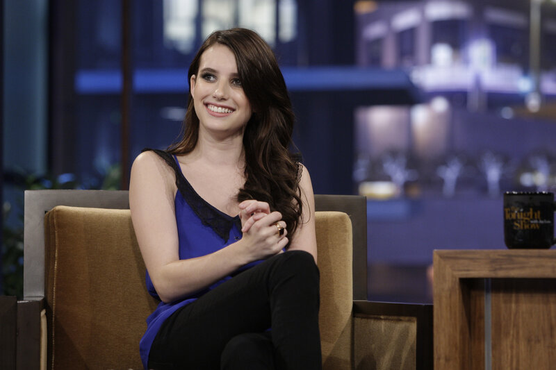 woman smiling on talk show