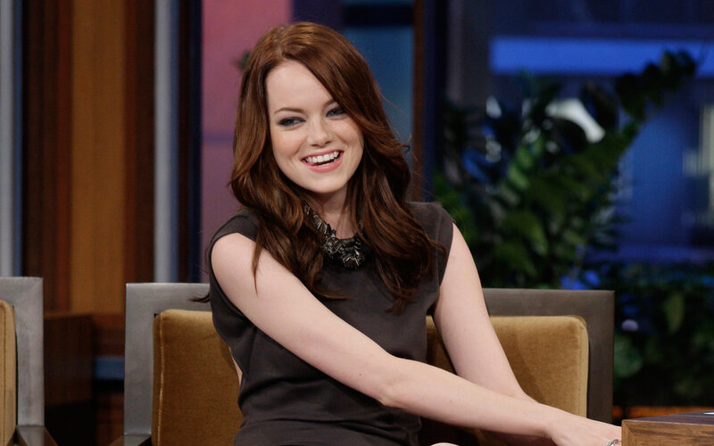 woman smiling on talk show