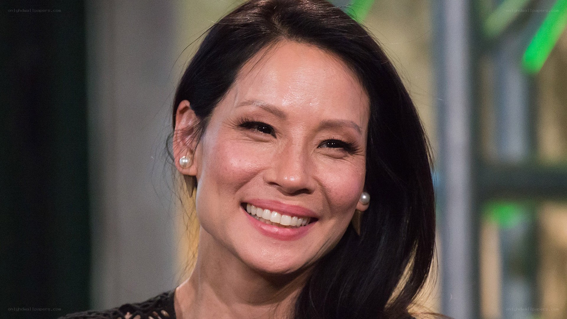 woman smiling on talk show