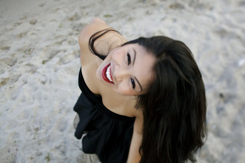 woman smiling on the beach