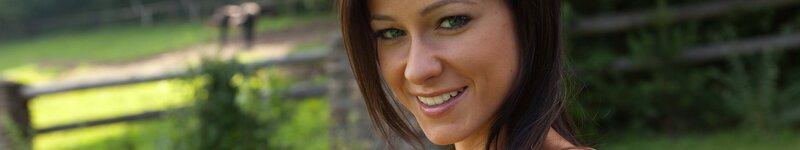 woman smiling outdoors