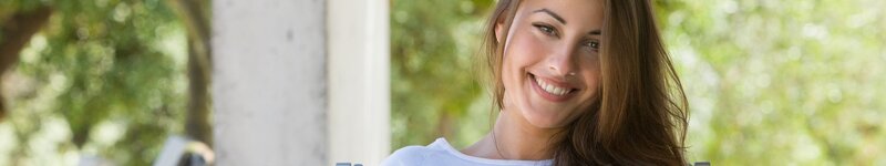 woman smiling outdoors