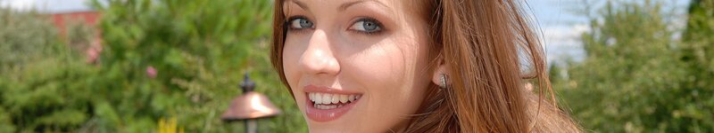 woman smiling outdoors