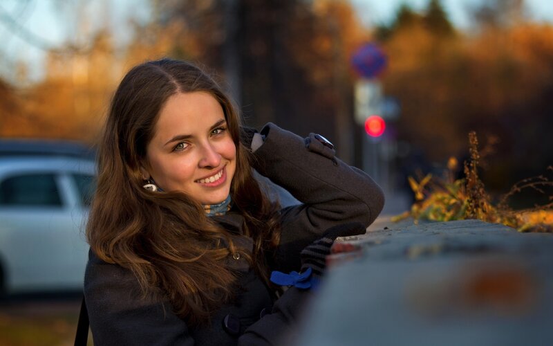 woman smiling outdoors