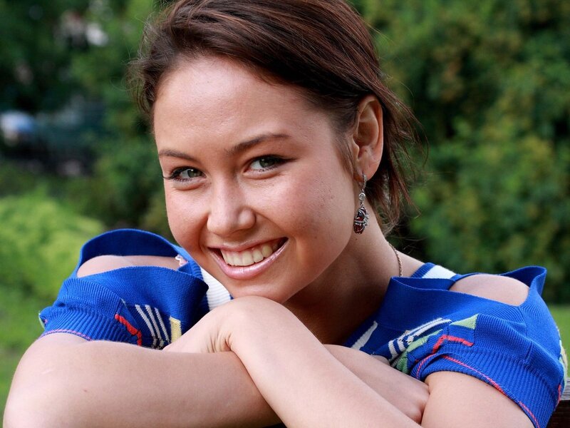 woman smiling outdoors