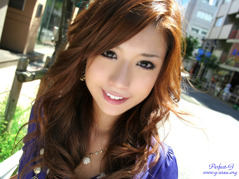 woman smiling outdoors