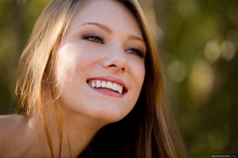 woman smiling outdoors
