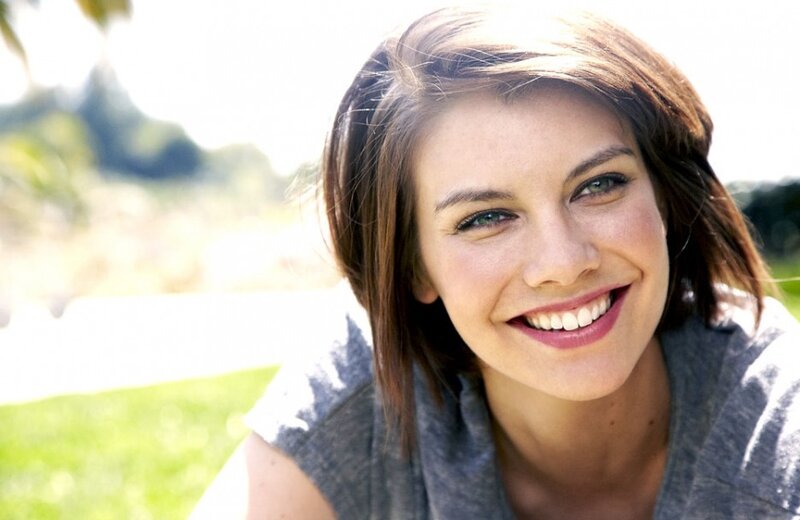 woman smiling outdoors