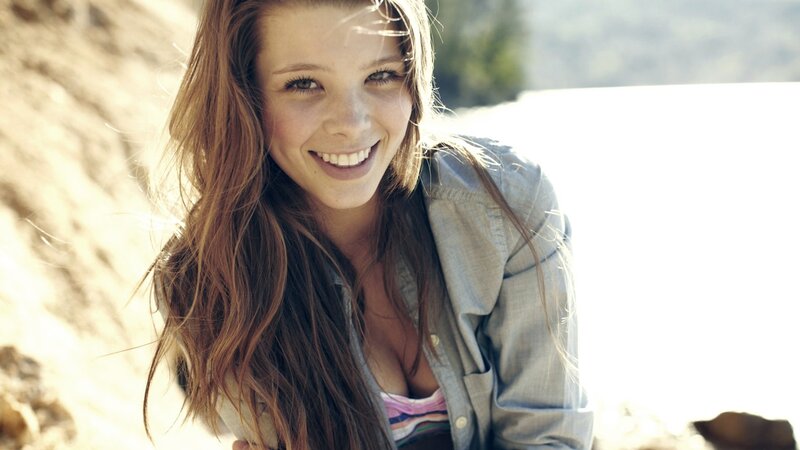 woman smiling outdoors