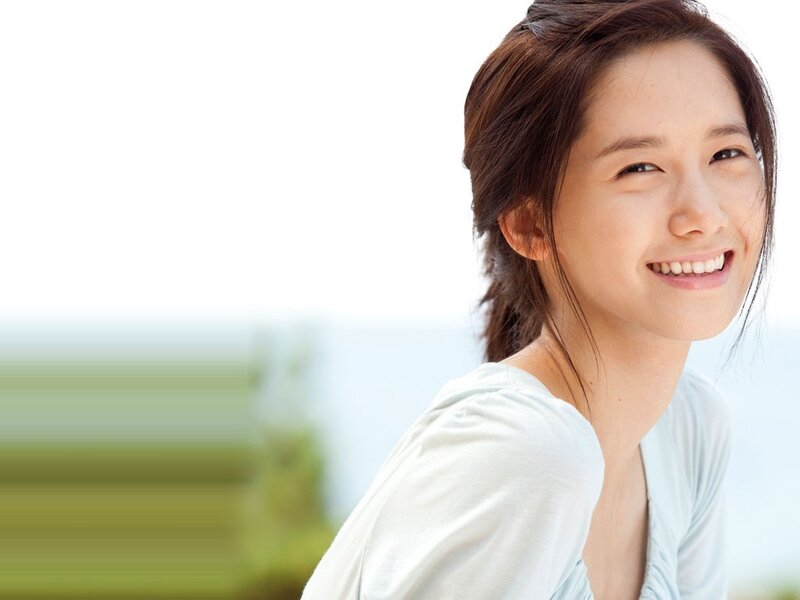 woman smiling outdoors