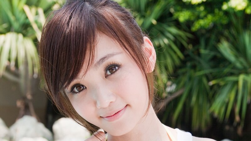 woman smiling outdoors