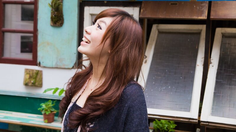 woman smiling outdoors