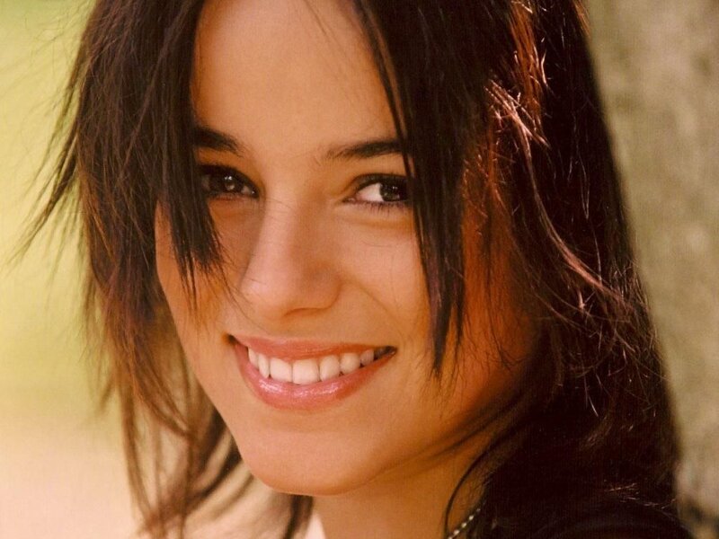 woman smiling outdoors